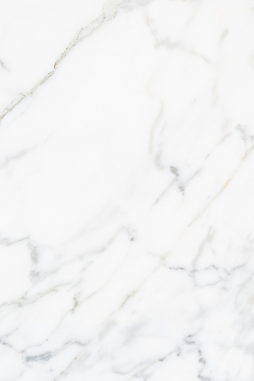 Close up of a white marble textured wall